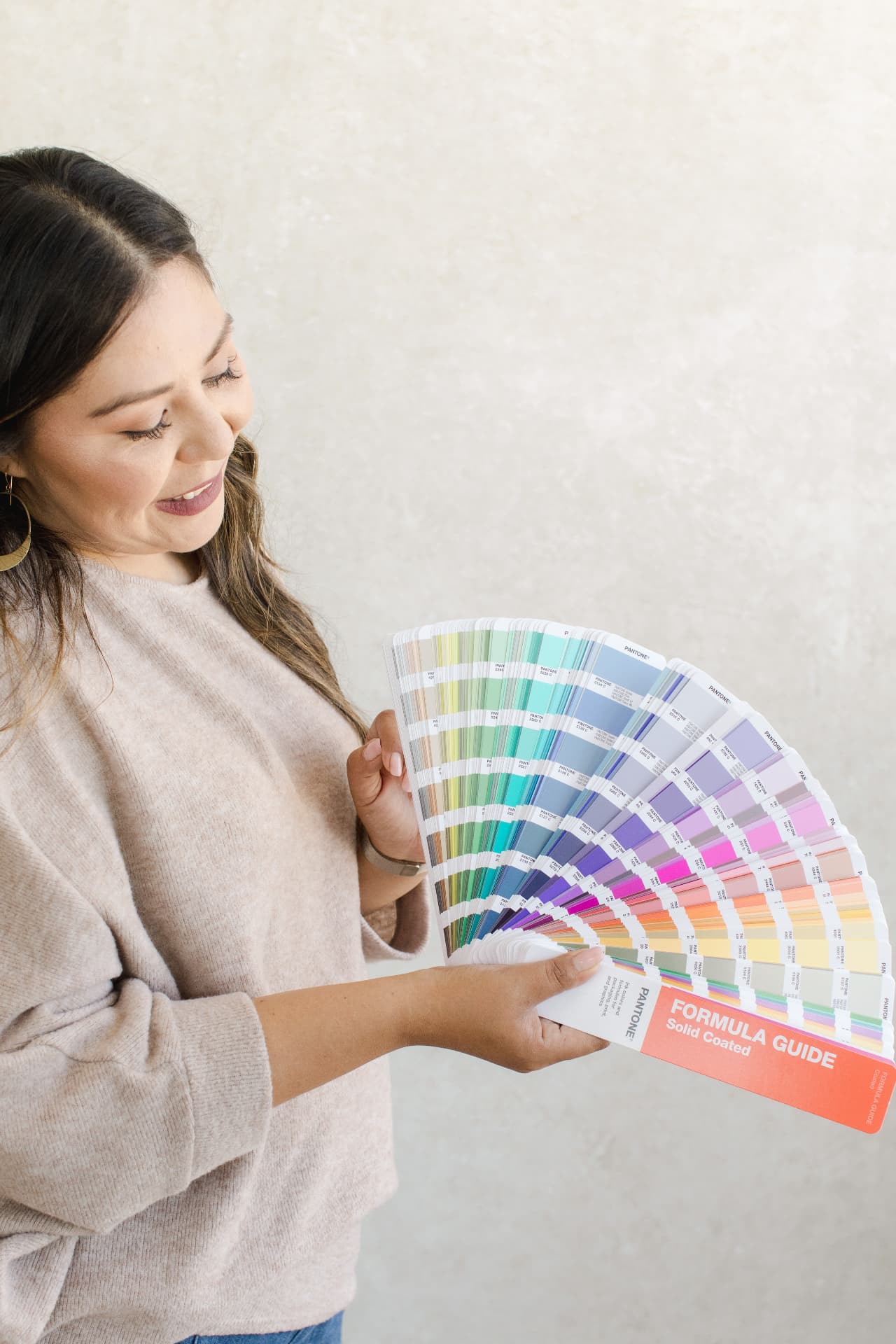 Karla Wenger reviewing a color guide